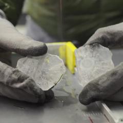A person holding a hail stone
